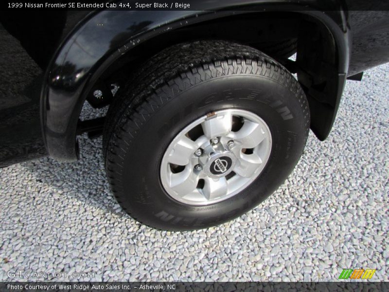Super Black / Beige 1999 Nissan Frontier SE Extended Cab 4x4