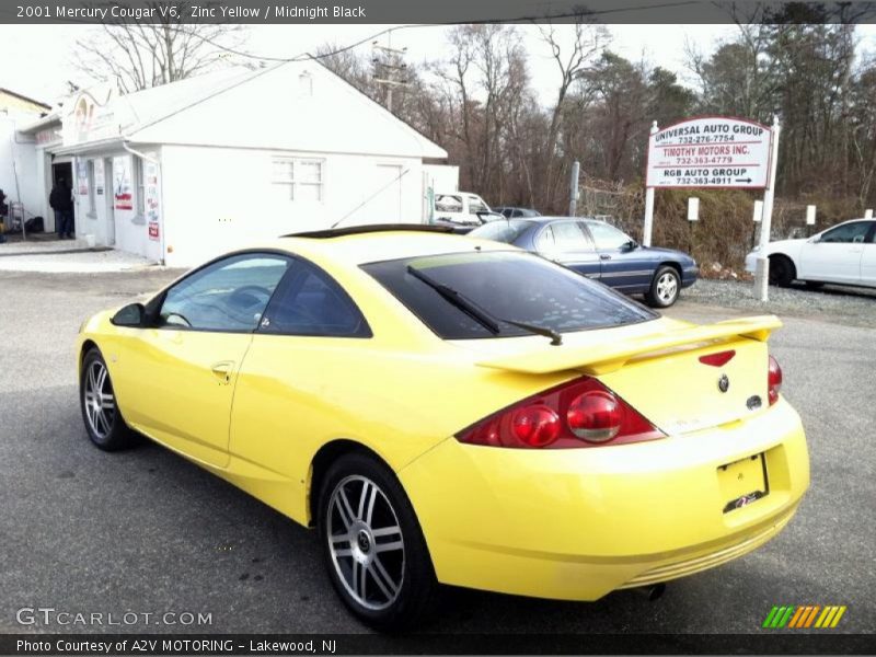 Zinc Yellow / Midnight Black 2001 Mercury Cougar V6