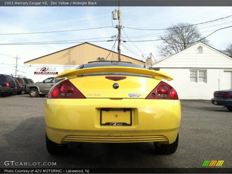 Zinc Yellow / Midnight Black 2001 Mercury Cougar V6