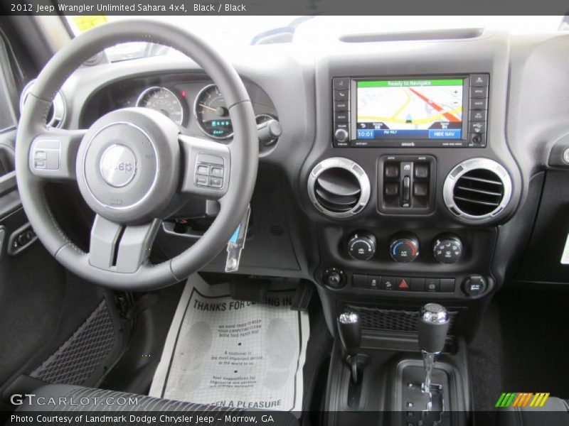 Black / Black 2012 Jeep Wrangler Unlimited Sahara 4x4