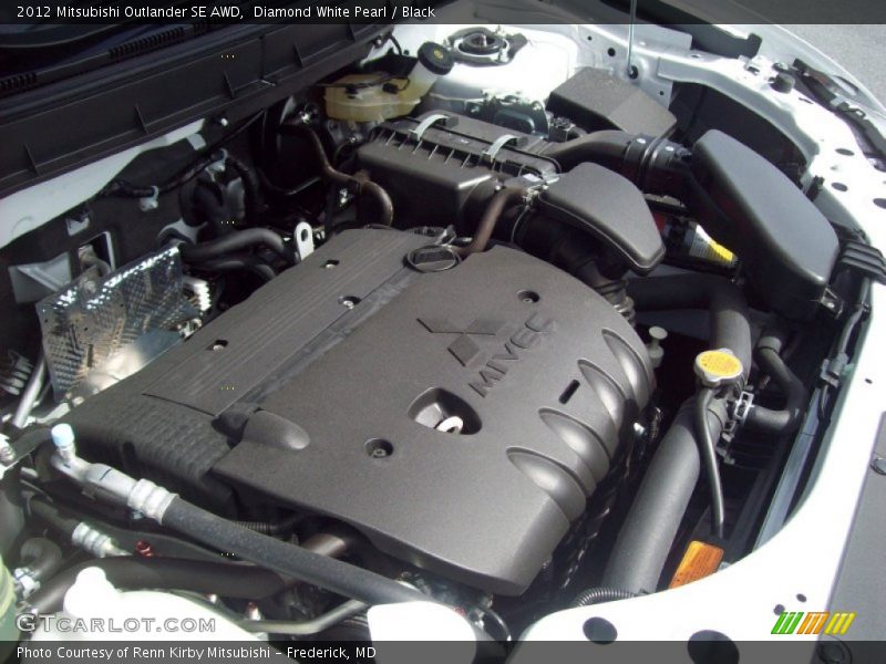 Diamond White Pearl / Black 2012 Mitsubishi Outlander SE AWD