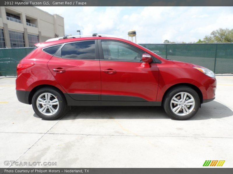 Garnet Red / Taupe 2012 Hyundai Tucson GLS