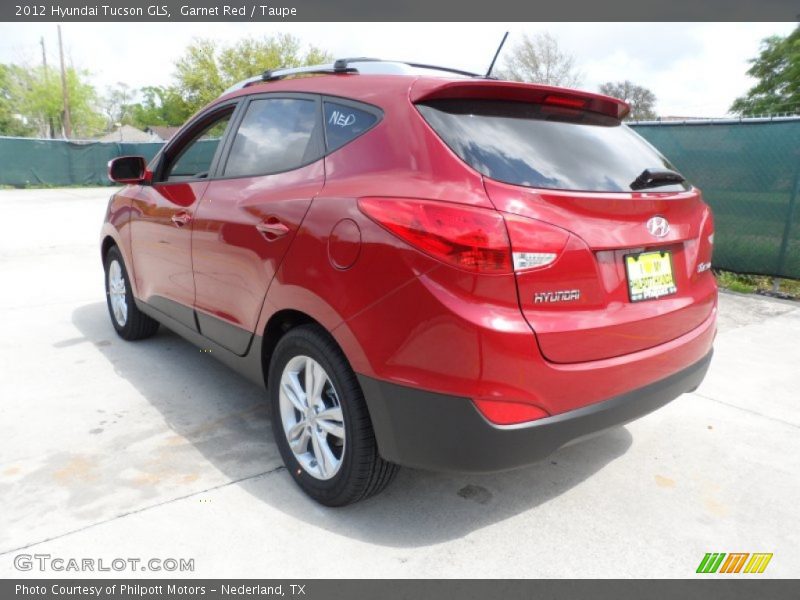 Garnet Red / Taupe 2012 Hyundai Tucson GLS