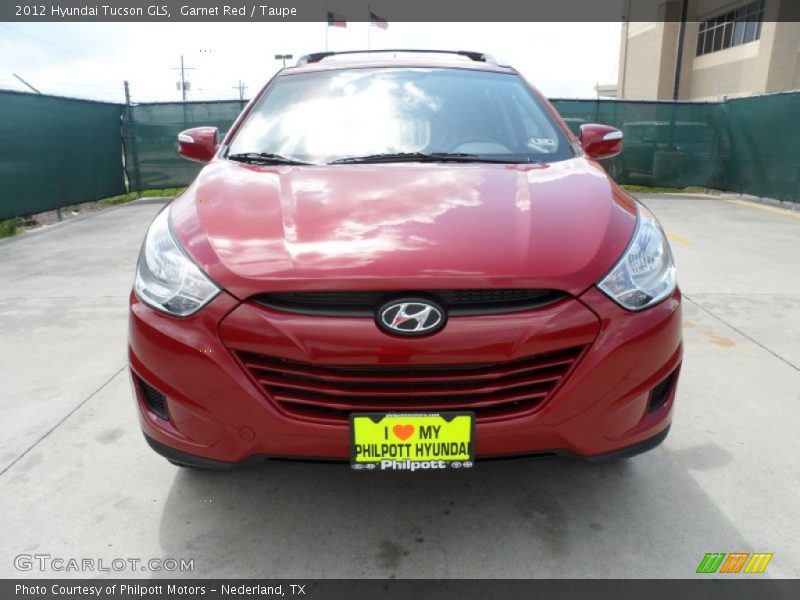 Garnet Red / Taupe 2012 Hyundai Tucson GLS
