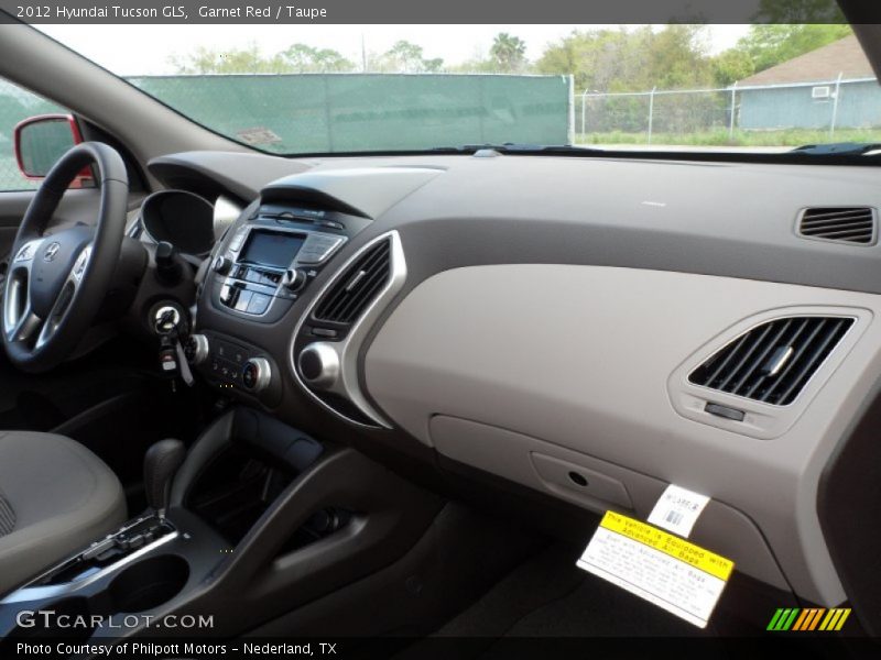 Garnet Red / Taupe 2012 Hyundai Tucson GLS