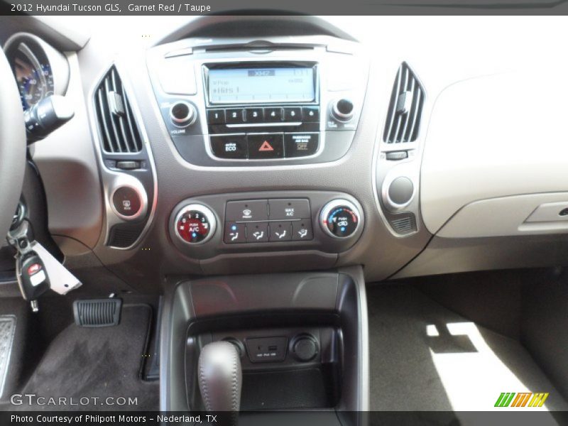 Garnet Red / Taupe 2012 Hyundai Tucson GLS