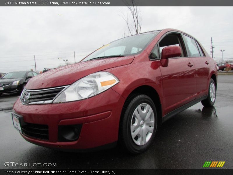 Red Brick Metallic / Charcoal 2010 Nissan Versa 1.8 S Sedan