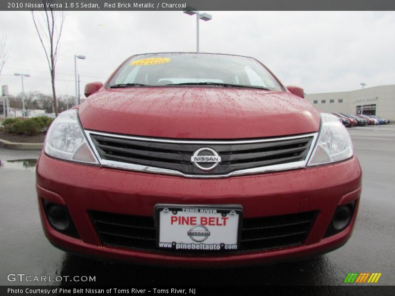 Red Brick Metallic / Charcoal 2010 Nissan Versa 1.8 S Sedan