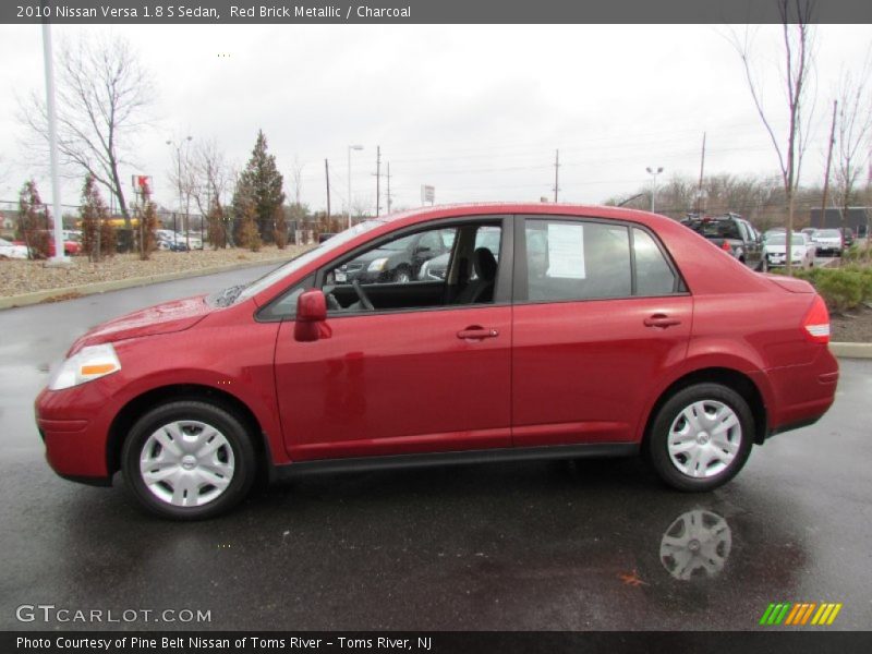 Red Brick Metallic / Charcoal 2010 Nissan Versa 1.8 S Sedan