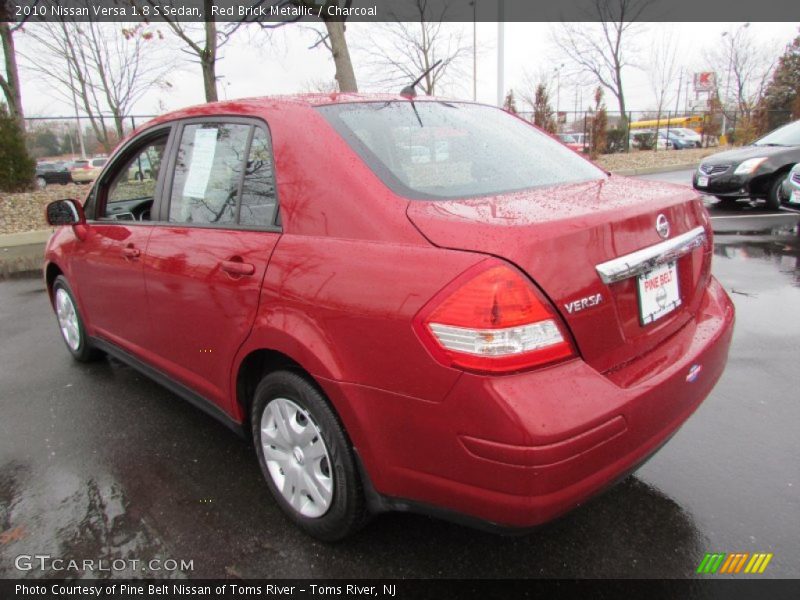 Red Brick Metallic / Charcoal 2010 Nissan Versa 1.8 S Sedan