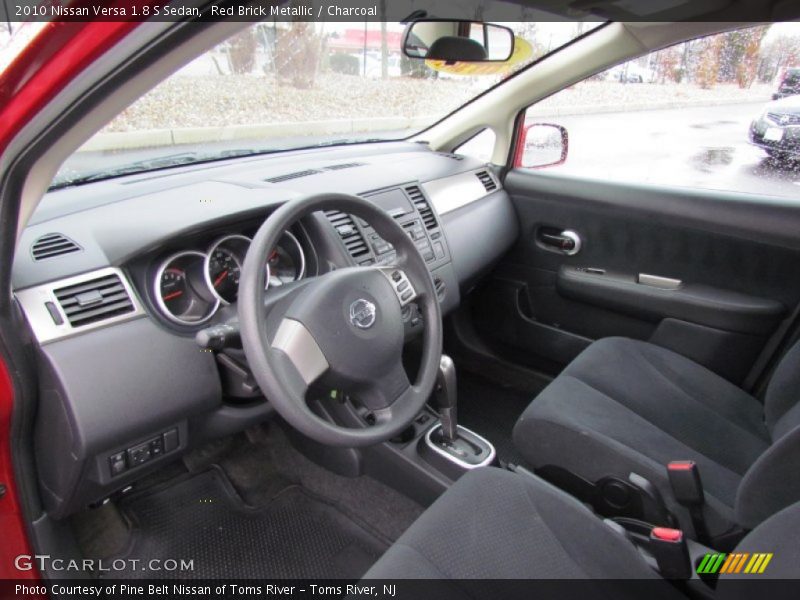 Red Brick Metallic / Charcoal 2010 Nissan Versa 1.8 S Sedan