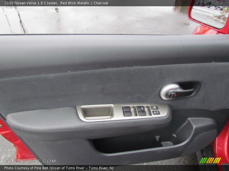 Red Brick Metallic / Charcoal 2010 Nissan Versa 1.8 S Sedan