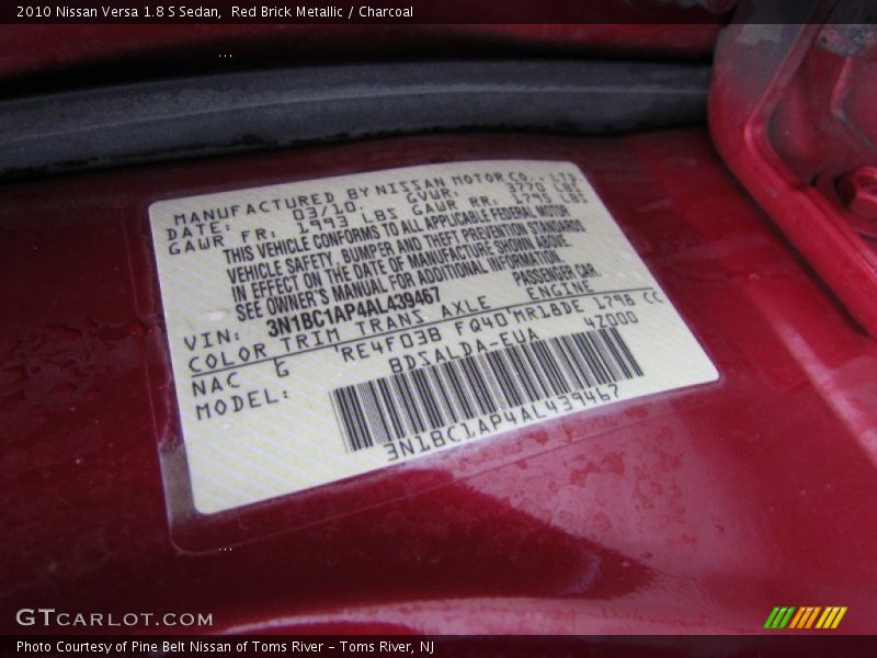 Red Brick Metallic / Charcoal 2010 Nissan Versa 1.8 S Sedan