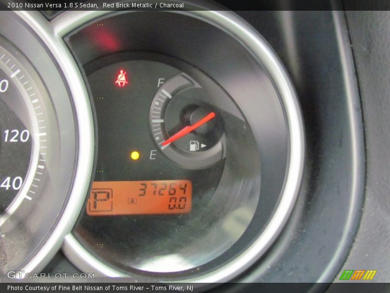 Red Brick Metallic / Charcoal 2010 Nissan Versa 1.8 S Sedan