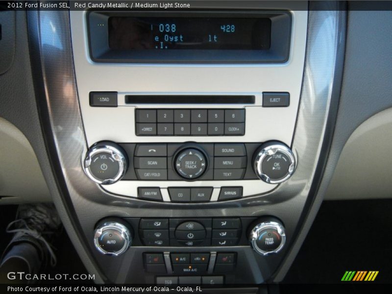 Red Candy Metallic / Medium Light Stone 2012 Ford Fusion SEL