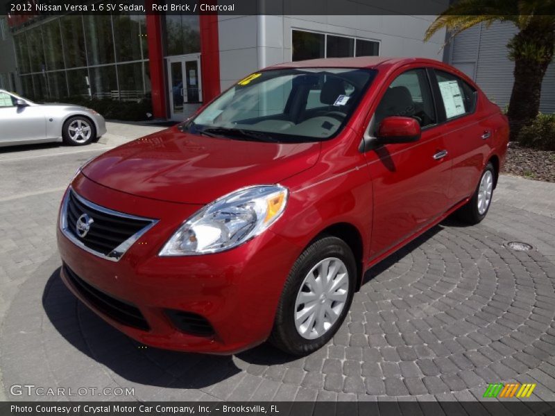 Red Brick / Charcoal 2012 Nissan Versa 1.6 SV Sedan
