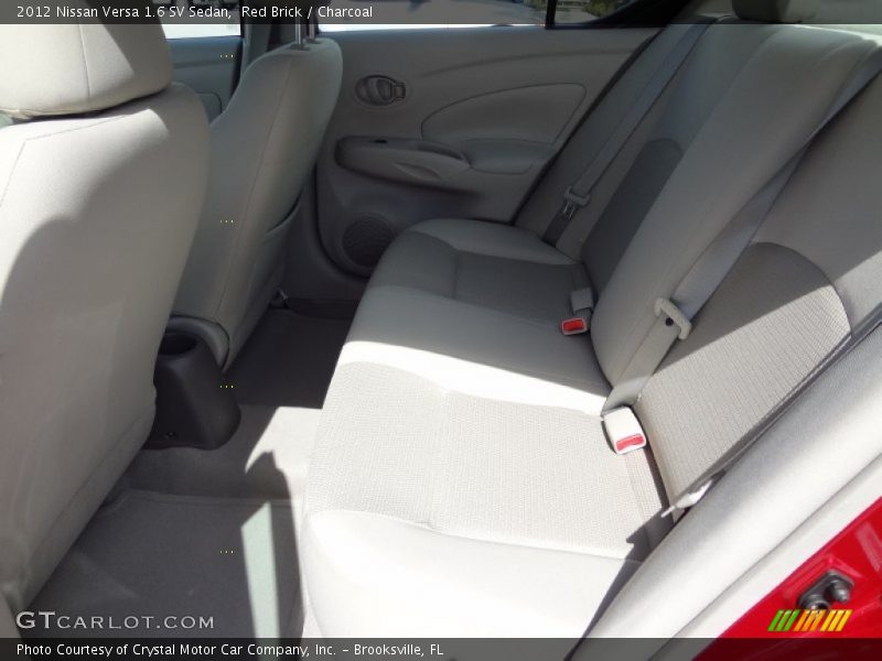 Red Brick / Charcoal 2012 Nissan Versa 1.6 SV Sedan