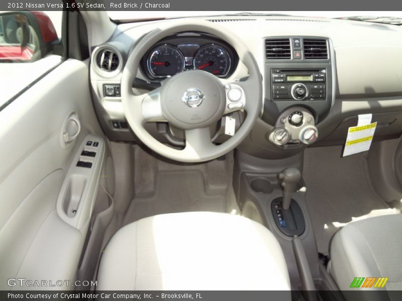 Red Brick / Charcoal 2012 Nissan Versa 1.6 SV Sedan
