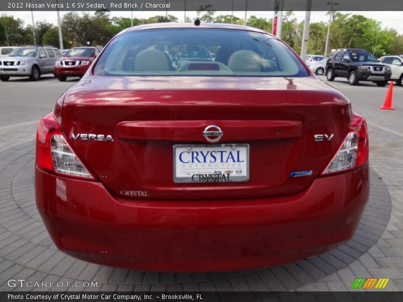 Red Brick / Charcoal 2012 Nissan Versa 1.6 SV Sedan