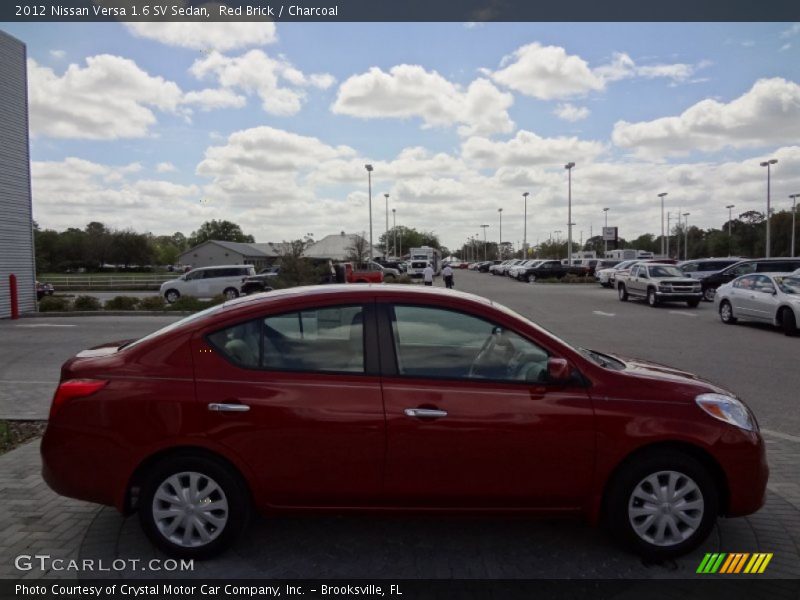 Red Brick / Charcoal 2012 Nissan Versa 1.6 SV Sedan
