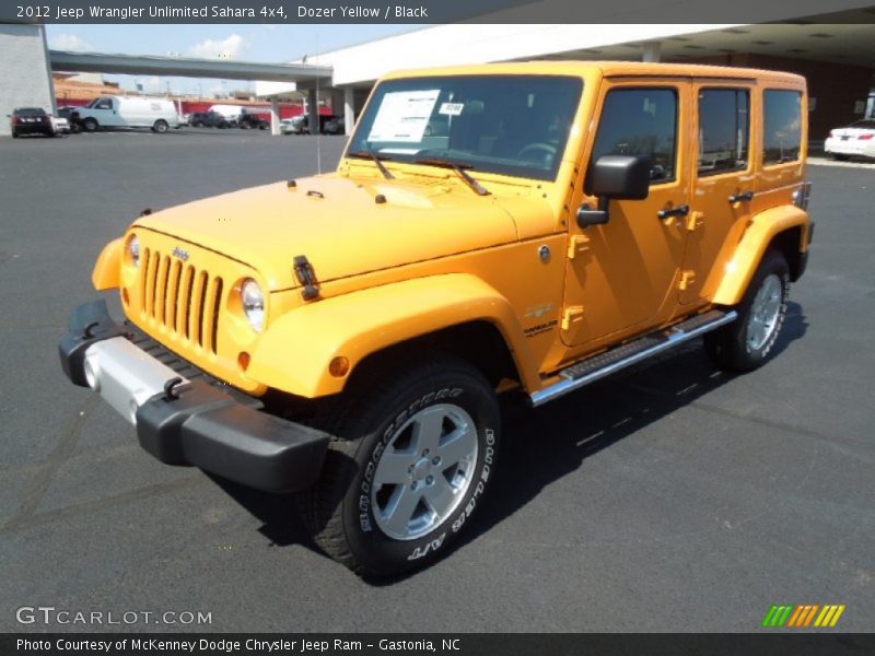 Dozer Yellow / Black 2012 Jeep Wrangler Unlimited Sahara 4x4