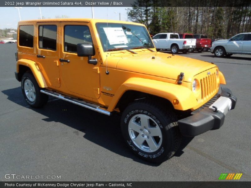Dozer Yellow / Black 2012 Jeep Wrangler Unlimited Sahara 4x4