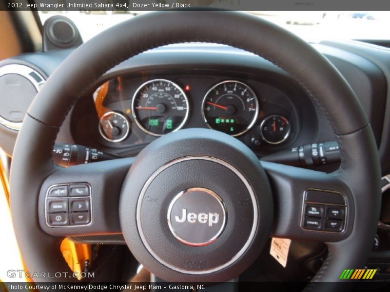 Dozer Yellow / Black 2012 Jeep Wrangler Unlimited Sahara 4x4