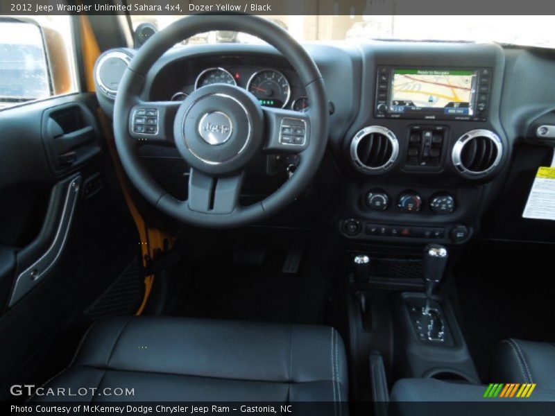 Dozer Yellow / Black 2012 Jeep Wrangler Unlimited Sahara 4x4