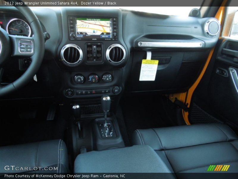 Dozer Yellow / Black 2012 Jeep Wrangler Unlimited Sahara 4x4