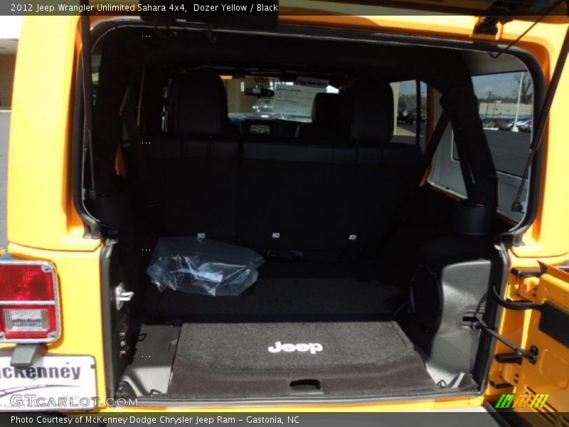 Dozer Yellow / Black 2012 Jeep Wrangler Unlimited Sahara 4x4