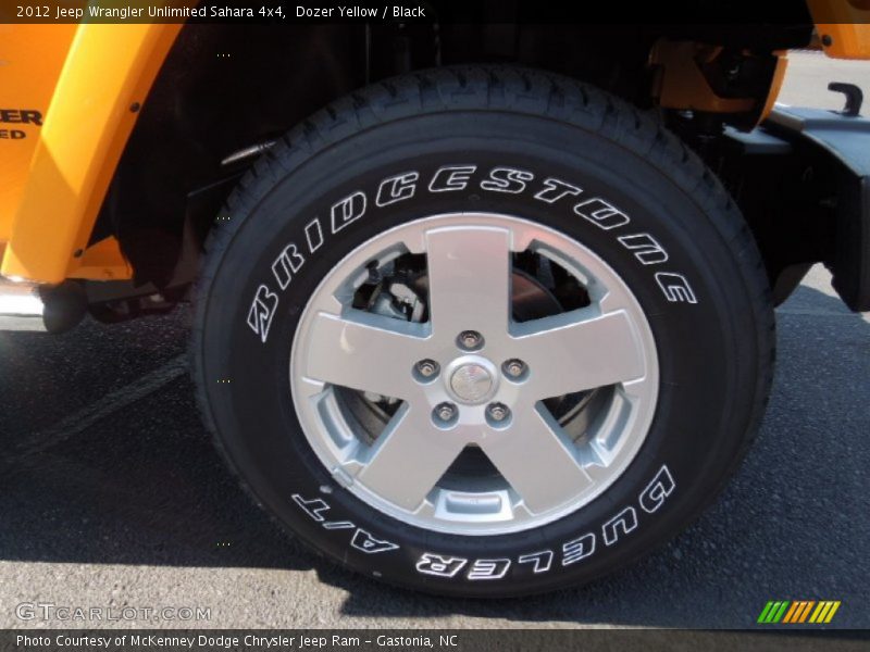 Dozer Yellow / Black 2012 Jeep Wrangler Unlimited Sahara 4x4