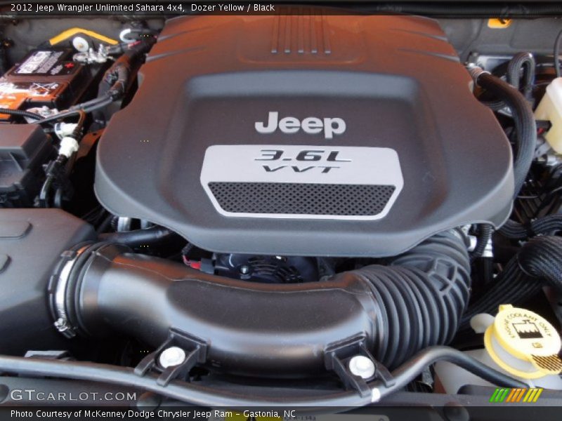 Dozer Yellow / Black 2012 Jeep Wrangler Unlimited Sahara 4x4