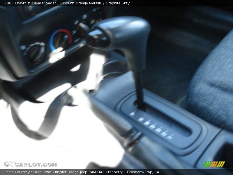 Sunburst Orange Metallic / Graphite Gray 2005 Chevrolet Cavalier Sedan