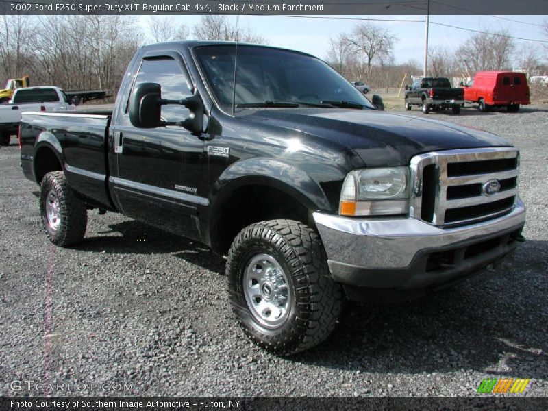 Front 3/4 View of 2002 F250 Super Duty XLT Regular Cab 4x4