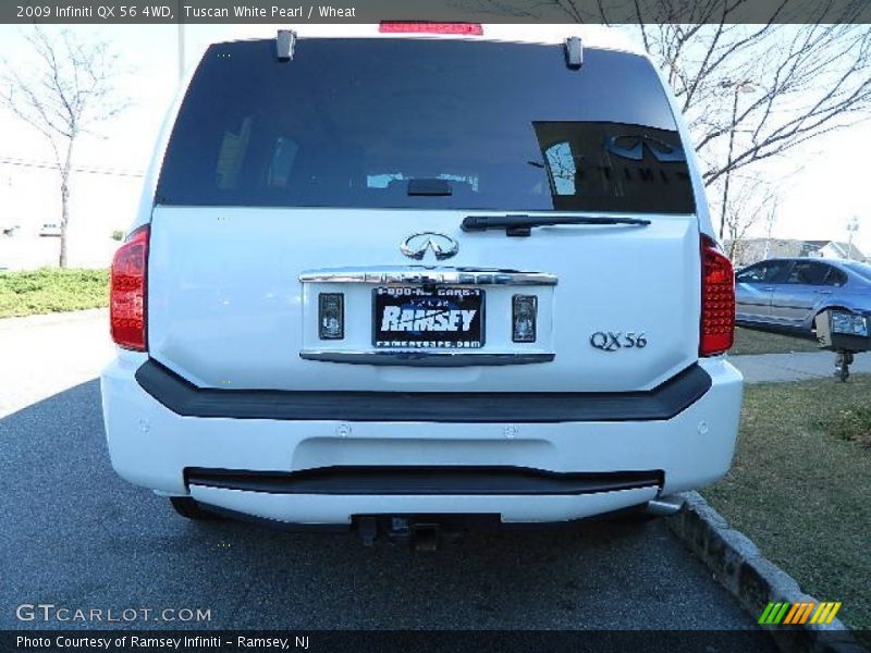 Tuscan White Pearl / Wheat 2009 Infiniti QX 56 4WD