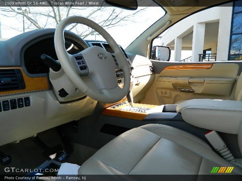 Tuscan White Pearl / Wheat 2009 Infiniti QX 56 4WD