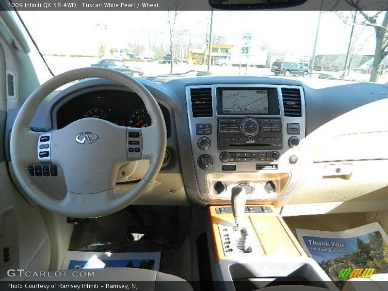 Tuscan White Pearl / Wheat 2009 Infiniti QX 56 4WD