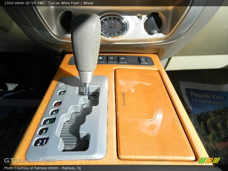 Tuscan White Pearl / Wheat 2009 Infiniti QX 56 4WD