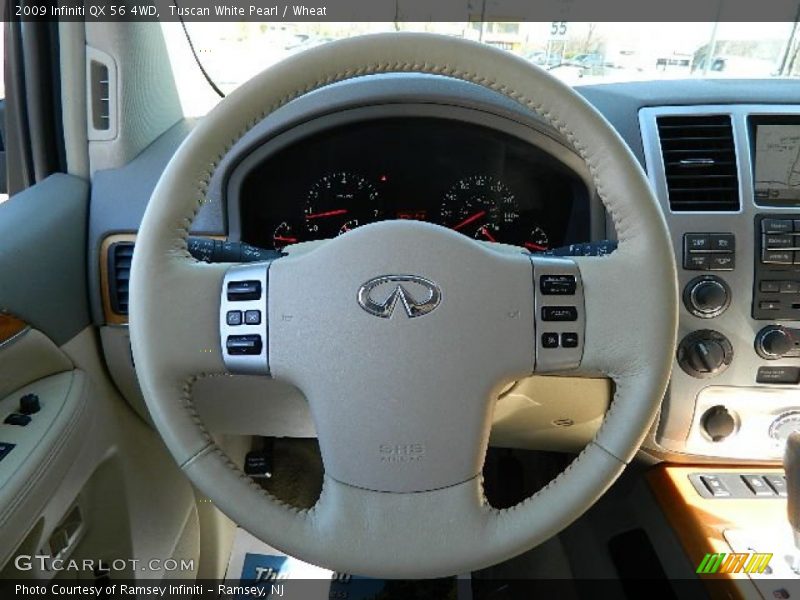 Tuscan White Pearl / Wheat 2009 Infiniti QX 56 4WD