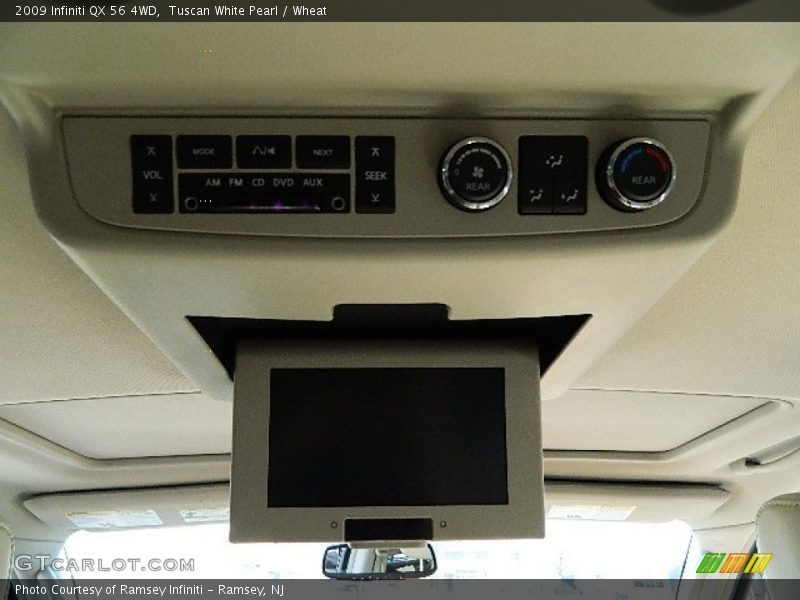 Tuscan White Pearl / Wheat 2009 Infiniti QX 56 4WD