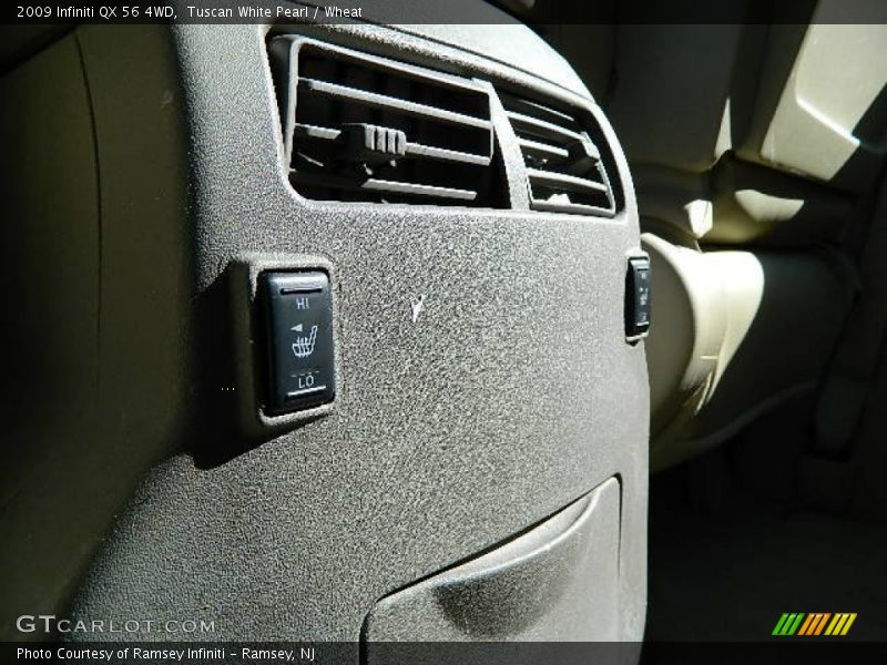 Tuscan White Pearl / Wheat 2009 Infiniti QX 56 4WD