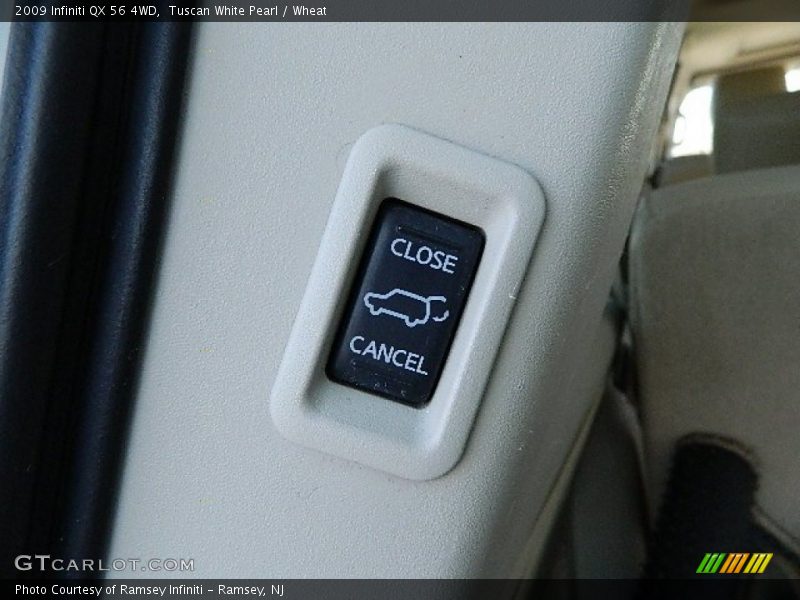 Tuscan White Pearl / Wheat 2009 Infiniti QX 56 4WD