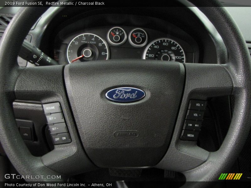 Redfire Metallic / Charcoal Black 2009 Ford Fusion SE