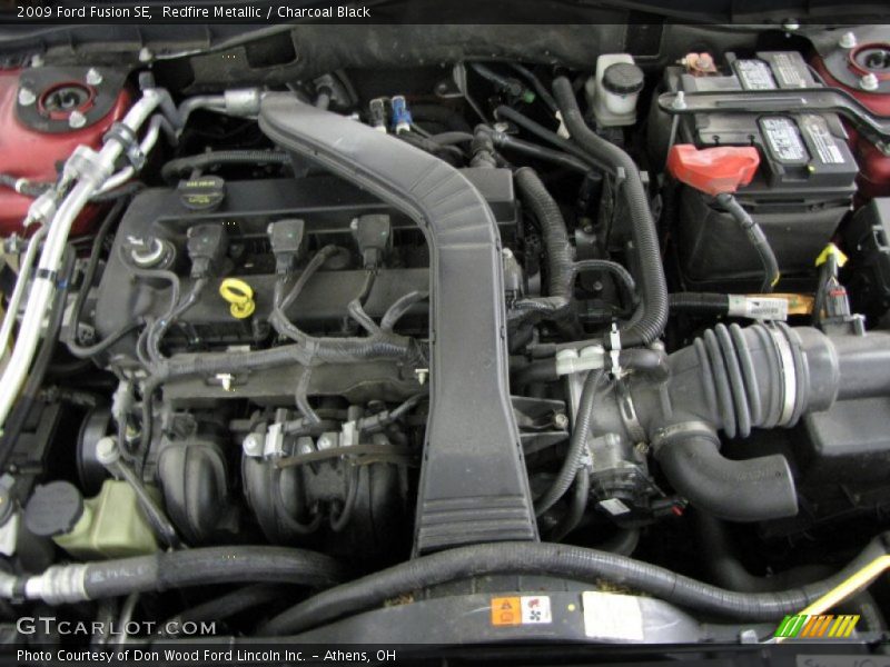 Redfire Metallic / Charcoal Black 2009 Ford Fusion SE