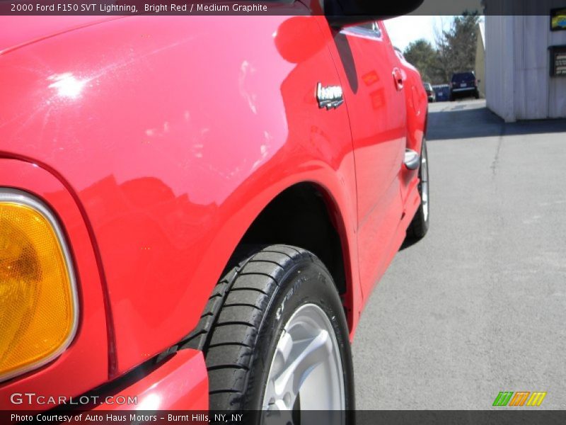 Bright Red / Medium Graphite 2000 Ford F150 SVT Lightning