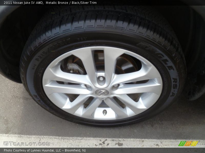 Metallic Bronze / Black/Silver Trim 2011 Nissan Juke SV AWD