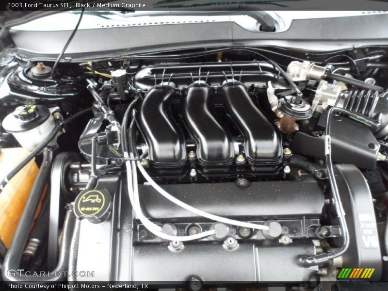 Black / Medium Graphite 2003 Ford Taurus SEL