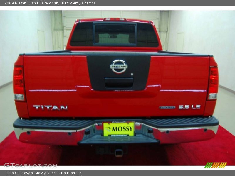 Red Alert / Charcoal 2009 Nissan Titan LE Crew Cab