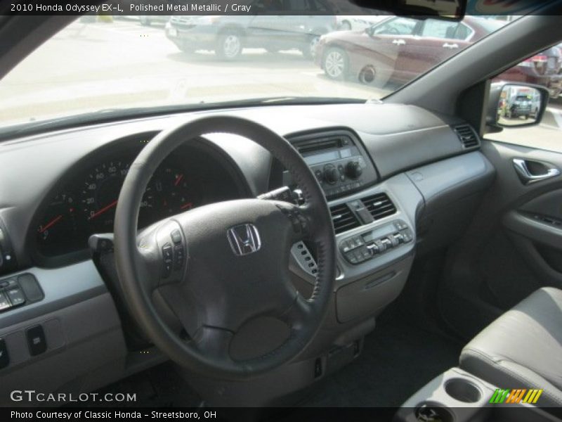 Polished Metal Metallic / Gray 2010 Honda Odyssey EX-L
