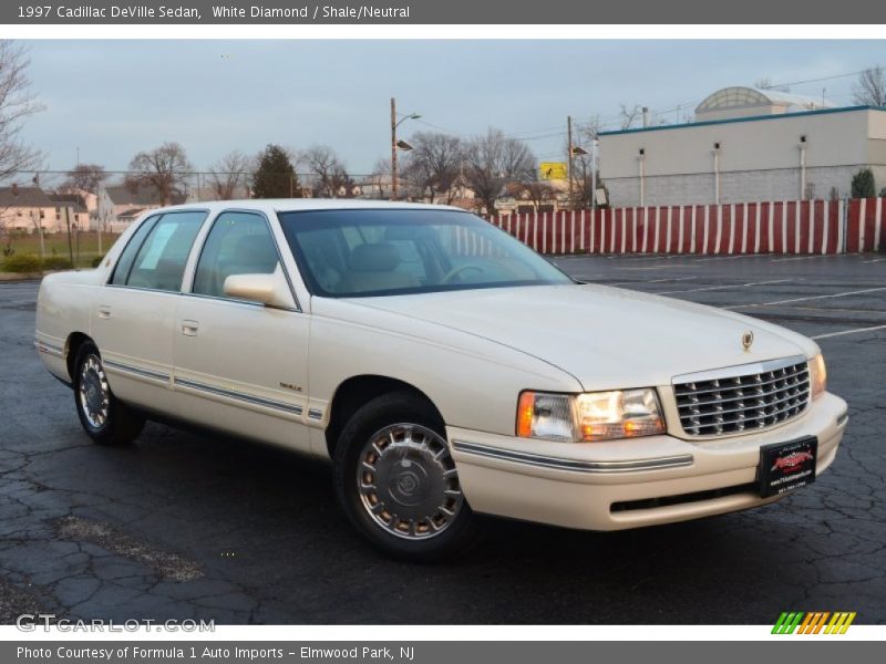 White Diamond / Shale/Neutral 1997 Cadillac DeVille Sedan